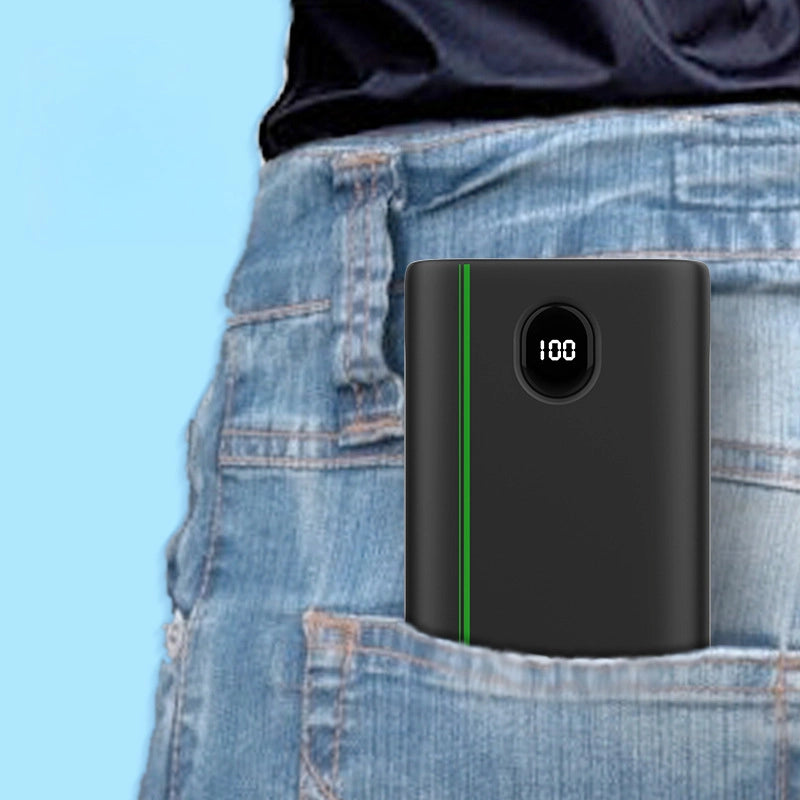 65W Two-Way Fast Charging 26800mAh Power Bank, half visible inside a man's back pocket of pants, showcasing portability