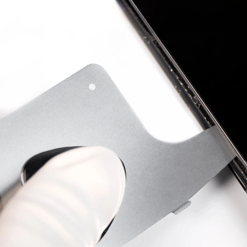 Close-up of the 3D Stainless Steel Screen Dismantling Tool prying open a phone screen, demonstrating precision and effectiveness for phone repair