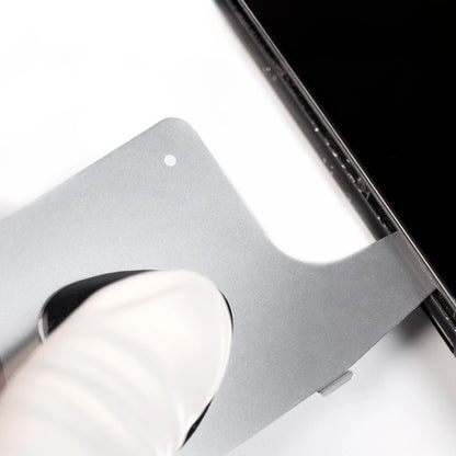 Close-up of the 3D Stainless Steel Screen Dismantling Tool prying open a phone screen, demonstrating precision and effectiveness for phone repair