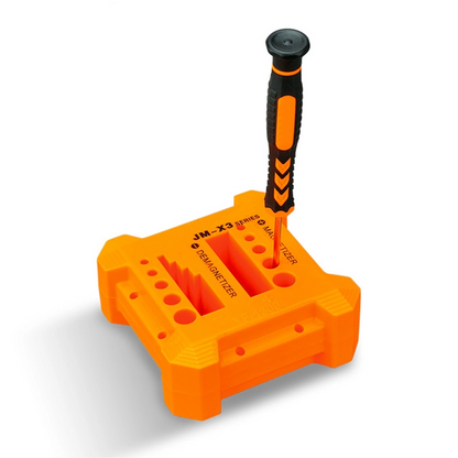 JM-X3 Small Screwdriver Magnetizer & Demagnetizer Tool placed on a table with a screwdriver inserted, showcasing its functionality for tool maintenance